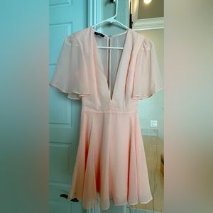 Bebe flowing dress with flutter sleeves